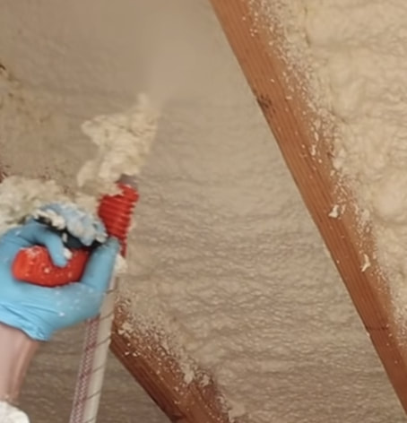 Actively spraying foam insulation in Appleton